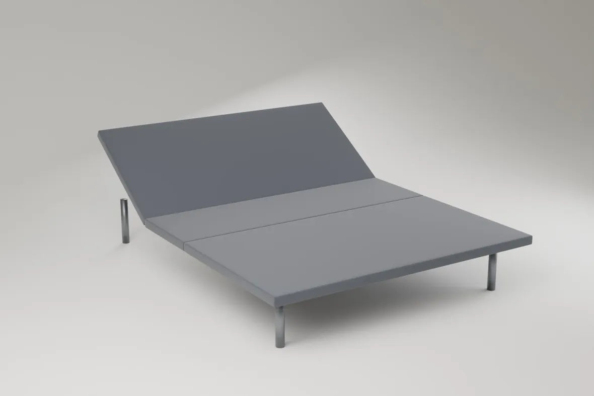 The adjustable base with the head section raised, standing on slim metal legs. Rendering, not a photograph of shipped goods.