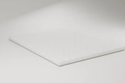 The topper lying flat with its quilted surface facing up, on a pale studio ground. Rendering, not a photograph of shipped goods.